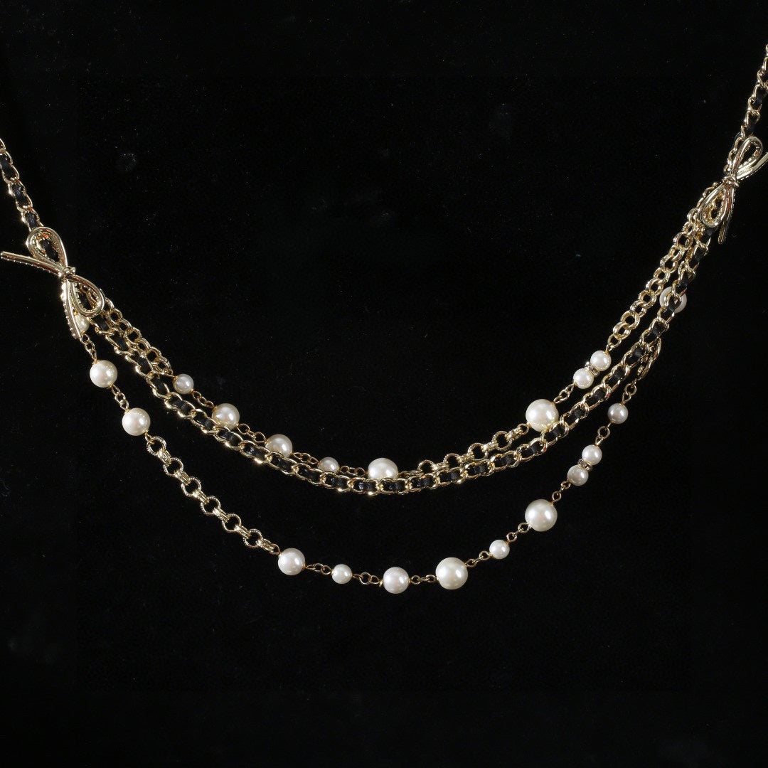 CHANEL 25S GOLD CHAIN BELT WITH PEARL 610440