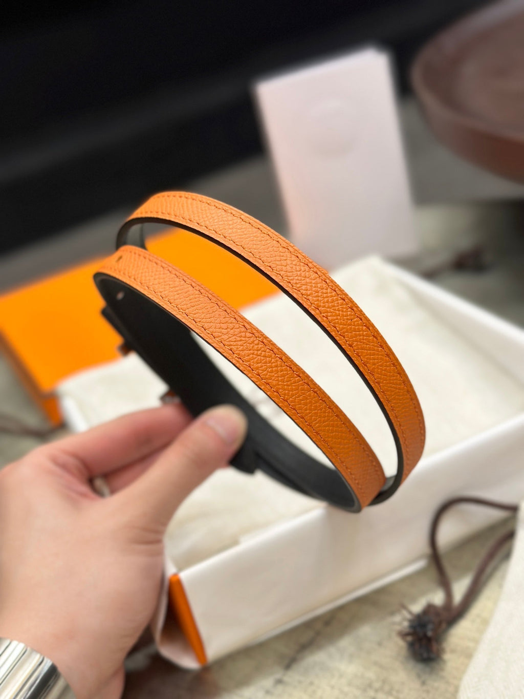 HERMES FOCUS BUCKLE & REVERSIBLE BLACK AND ORANGE LEATHER STRAP 13MM COPPER HARDWARE