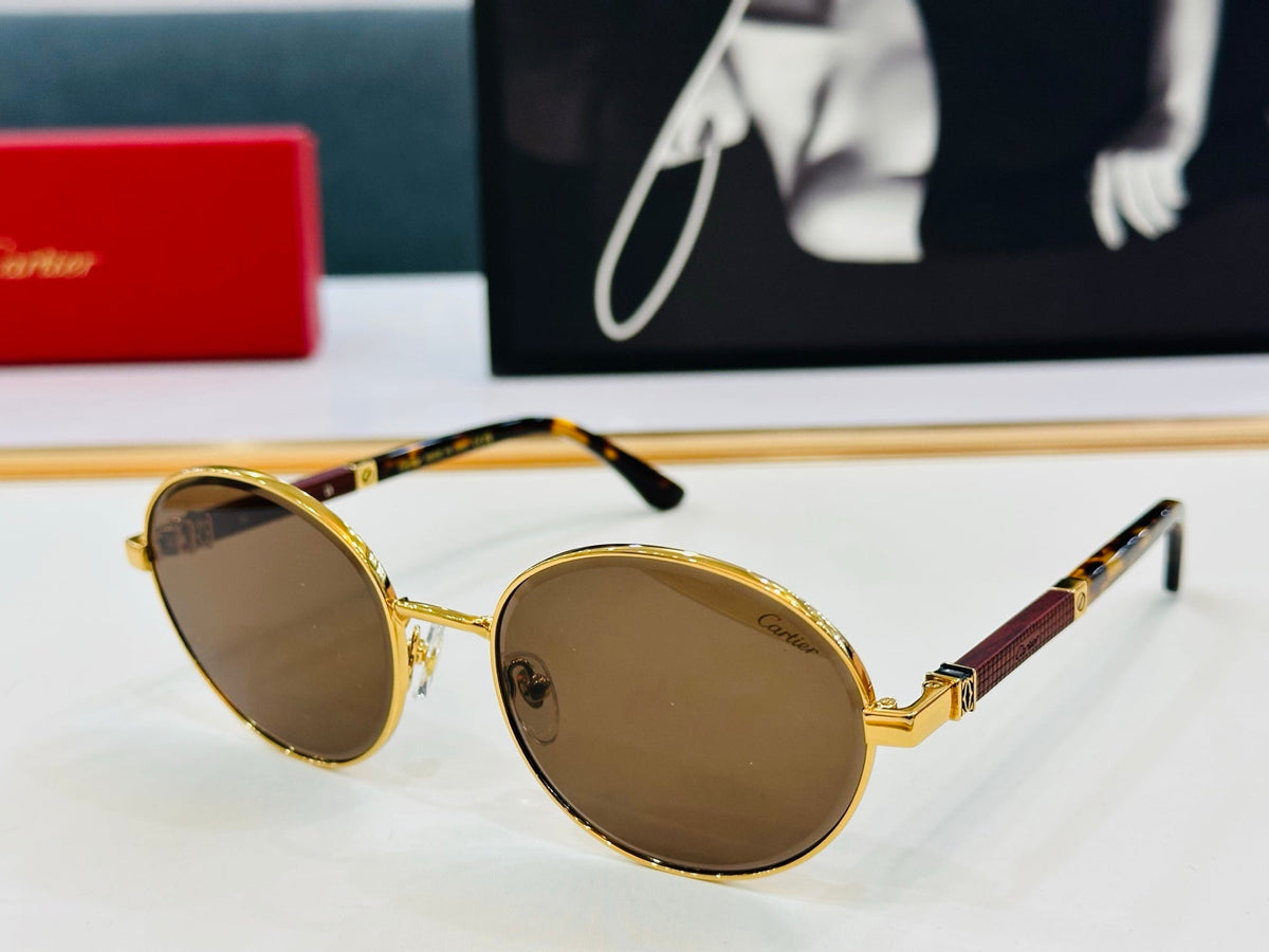 CARTIER PREMIÈRE ROUND FRAME SUNGLASSES CT0490S IN METAL