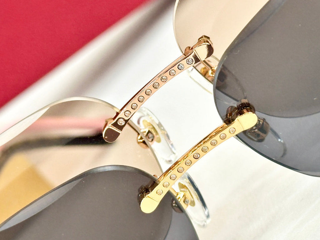 CARTIER PANTHÈRE RIMLESS RECTANGULAR FRAME SUNGLASSES CT0687S IN METAL