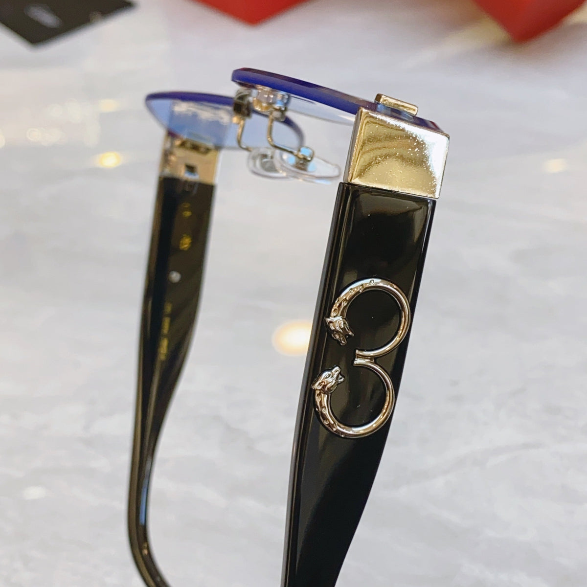 CARTIER PANTHÈRE RHOMBUS FRAME SUNGLASSES CT00638S IN METAL AND ACETATE